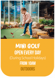 Young girl playing mini putt putt at glenelg