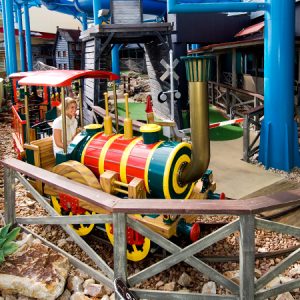 Train going around on Mini Golf course
